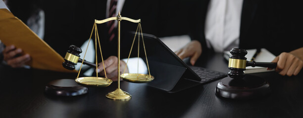 Judges desk in court room, Business and lawyers discussing contract.
