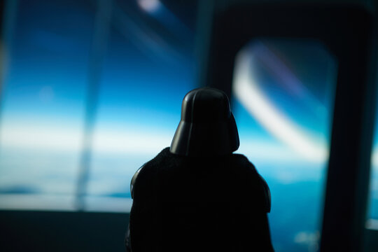 Darth Vader action figure in a space ship looking out in to the vastness of outer space shot on 07-08-2024,