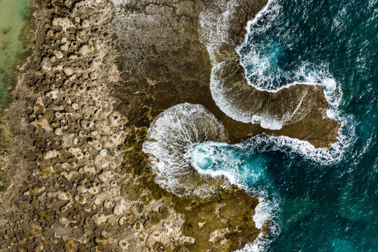 Reef, tide pools, and crashing waves on North Shore of Oahu