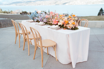 Luxury wedding table with vibrant floral centerpiece