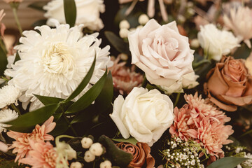 Warm pink floral arrangment close up