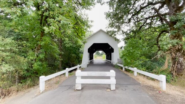 Historic Irish Bend Covered Bridge in Corvallis, Oregon. Panning shot.