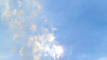 Mascleta fireworks exploding in the bright clear blue sky in the daytime in Valencia city, Spain. Backgrounds. Fallas festival