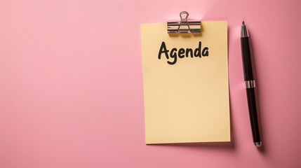 agenda meeting schedule on clipboard with pen isolated on light pink background with copy space for text