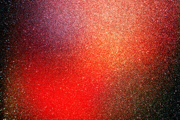 Black red orange golden brown shiny glitter abstract background with space. Twinkling glow stars...