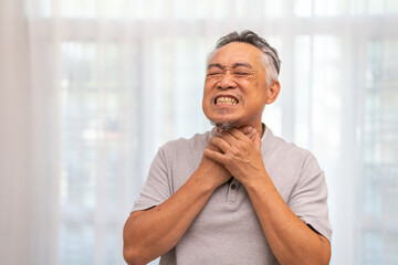 Naklejka premium Sick senior man touching neck unwell coughing with sore throat pain,lung cancer,bronchitis,Bronchial Asthma,Tuberculosis,pneumonia,covid-19,eco air pollution pm2.5.insurance and hospital