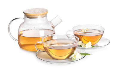 Aromatic jasmine tea in cups, flowers and teapot isolated on white