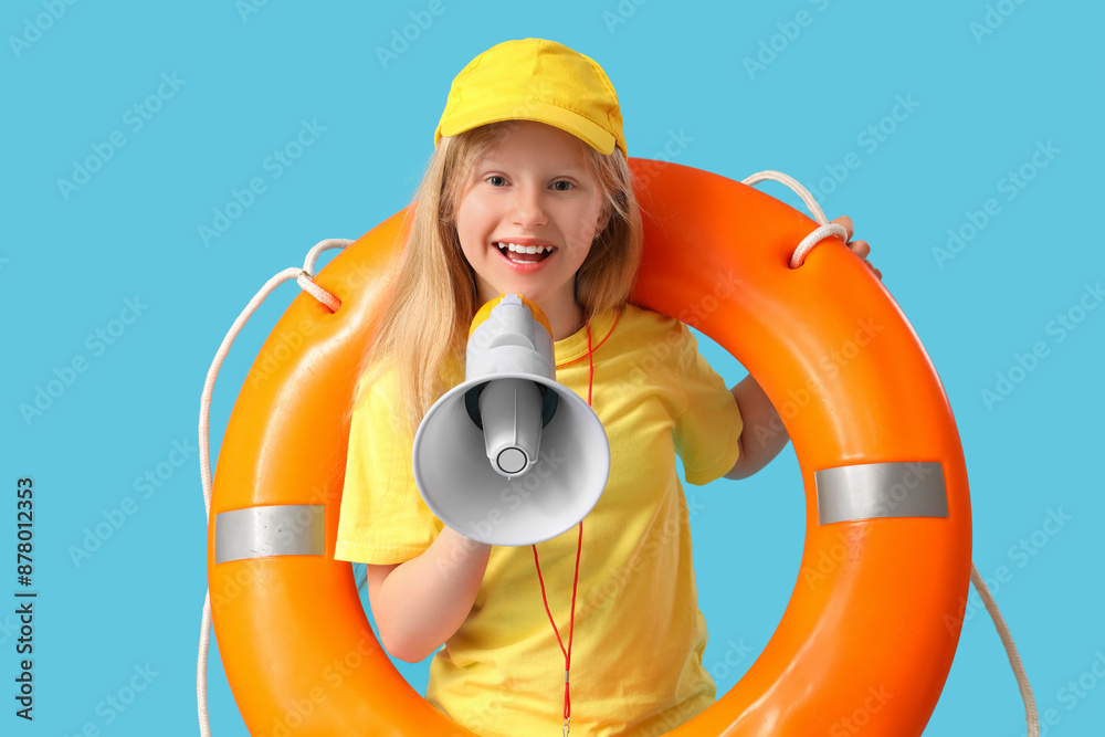 Poster Happy little girl lifeguard with ring buoy and megaphone on blue background