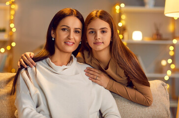 Mother and young daughter portrait, family in love, happy motherhood emotion. Mother's Day parent, teen celebrate holiday in gentle hug, enjoy good time together, healthy understanding relationships