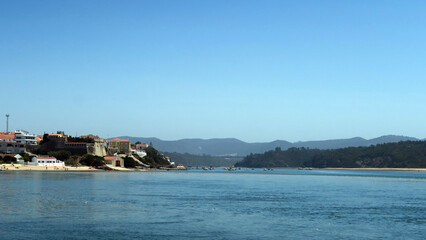 Fototapeta premium Vila Nova de Milfontes, Portugal. Praia da Franquia or Vila Nova de Milfontes Beach is located on the urban seafront of Vila Nova de Milfontes.It belongs to the mouth of the Mira River