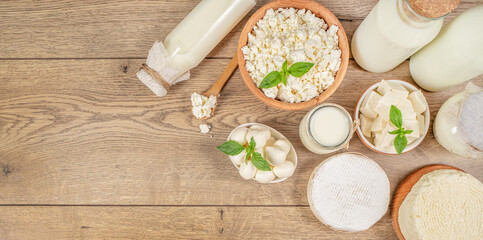 dairy products, Bottle milk, cheeses, cottage cheese, eggs, yogurt, butter, top view. copy space for text