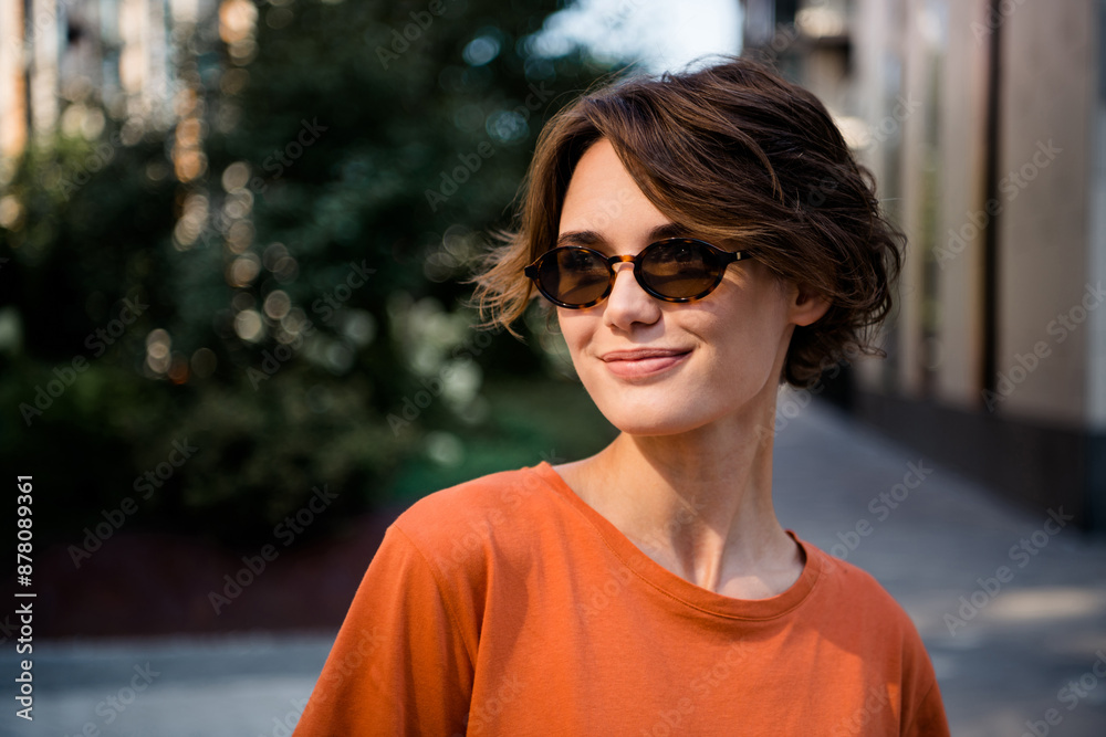 Wall mural photo of lovely pretty girl dressed stylish clothes walking outdoors going after university lectures