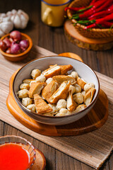 Pentol is a type of snack which can be found in Indonesia. it's a type of beef meatballs with flour, usually given with peanut sauce and sambal.