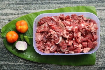 fresh beef cube in plastic container