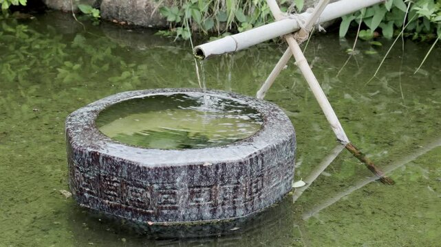 Tokyo Scene : Bamboo Water Fountains and Stone Basins  |  Tokyo, Japan