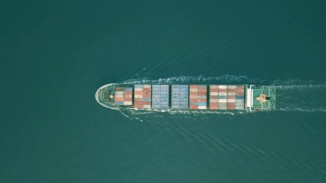 Aerial View of Freight Ship with Cargo Containers
