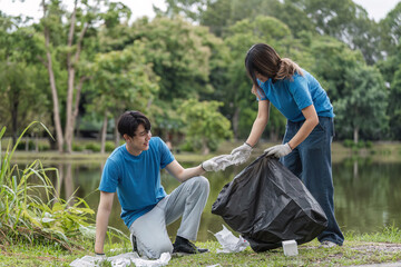 Volunteer Team Cleaning Up a Natural Park Area to Protect the Environment and Promote Sustainability