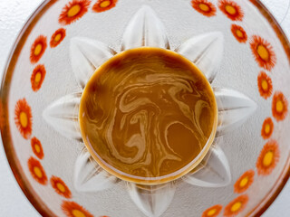 coffee in a glass with an abstract texture