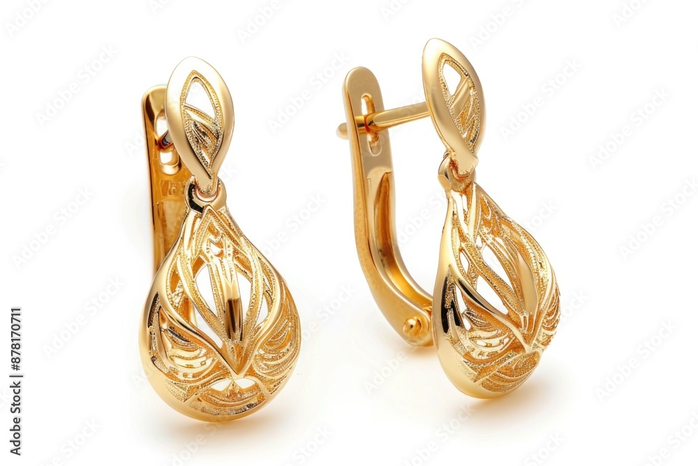 Wall mural earrings: gold jewellery accessory with gemstone detail in isolated setting