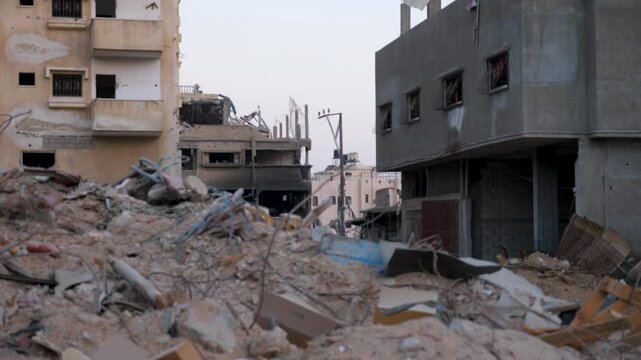 Residential buildings destroyed in an Israeli strike in the southern Gaza Strip