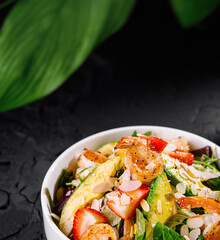 Fresh shrimp and strawberry salad bowl