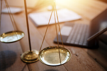 Judge gavel with Justice lawyers having team meeting at law firm background. Concepts of Law and...