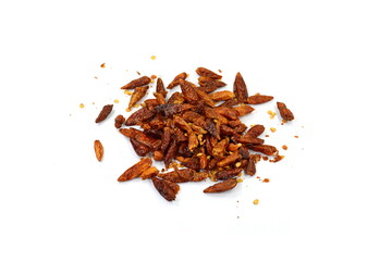 Red chilli flakes, Hot crushed red cayenne pepper flakes scattered over white background.dried chili flakes and seeds 
