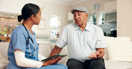 Obraz premium Elderly care, doctor and retired man on sofa for discussion, routine check up or diagnosis in living room. Female carer, senior patient and consultation on couch for healthcare, wellbeing or medicare