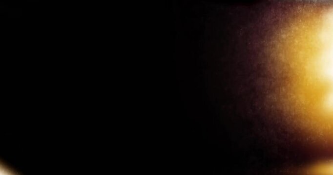 Warm lens flares and light leaks flashes retro vintage film burn 4K effect. High quality 4k footage