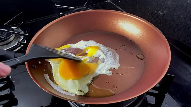 Pan sizzles with hot oil, homemade Ovo-vegetarian cooking, slow motion