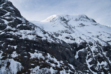 Norwegian landscape. The road leads through a mountain gorge that descends, glacier