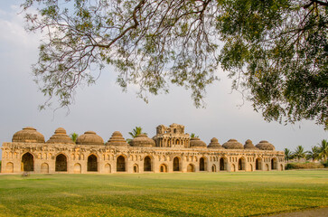Fototapeta premium Ancient ruins of the Royal Elephant Stables, Royal Centre, 14th century, Vijayanagara kingdom, Hampi, Karnataka, India, Asia.