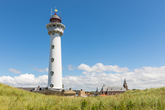 Lighthouse and church at Egmond Aan Zee, The netherlands