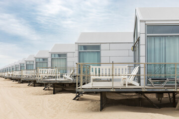 Row of holiday homes at a dutch North Sea beach