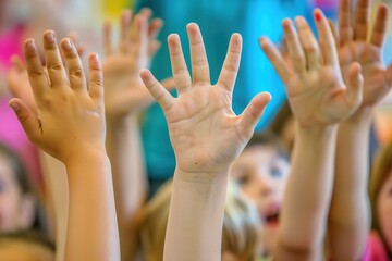 Children Raising Hands in Classroom Back to school