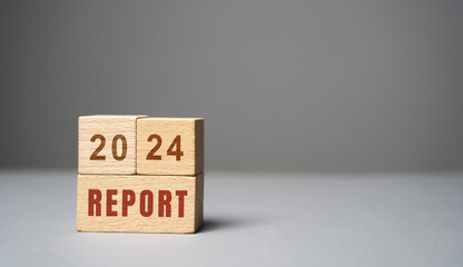2024 report in wooden blocks. Financial reporting of the company. Profit and revenue. Business and...