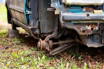 Detail of car axle with knuckle, ball joint and parts
