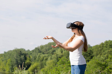 woman uses virtual reality glasses