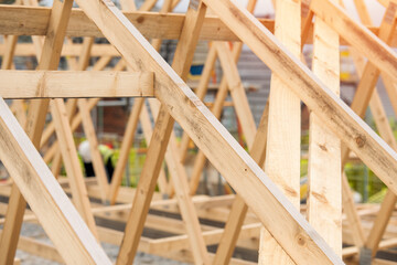 Wooden Roof Truss Construction During Daytime