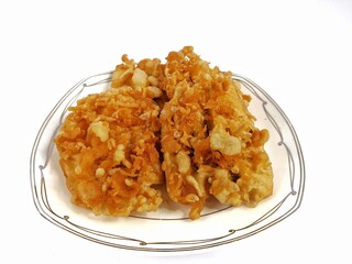 Fried Bananas in a glass plate on a white background