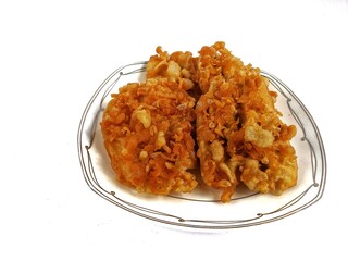 Fried Bananas in a glass plate on a white background