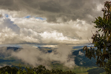 Low clouds floating over t he mountains in the eastern Andean range of Colombia, in a overcast afternoon, near the town of Arcabuco.