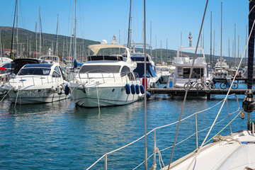 Fototapeta premium Sunny Day at the Marina with Luxury Yachts