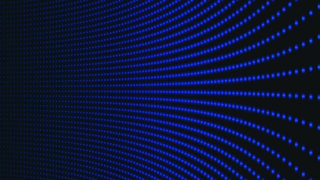 Blue light bulbs on a black background. Blue dot display. LED panel. Halogen flashing lights. Stage consecration. A flash of spotlights at a disco. Blue pixel digital computer screen. blue garland