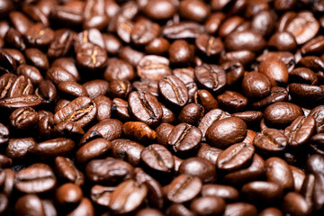 Background with many roasted coffee beans,Texture of roasted coffee beans