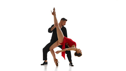 Passion in every move. Han dome man and beautiful woman, dancers performing bachata isolated on...