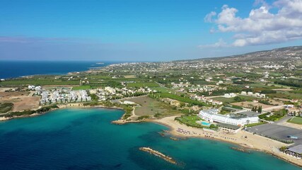 Aerial view of Laourou Beach, also known as Corallia Beach, one of the best beaches in Cyprus near Coral Bay, Paphos district, Cyprus.