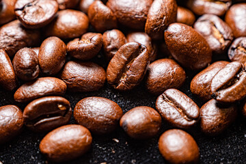 Background with many roasted coffee beans,Texture of roasted coffee beans