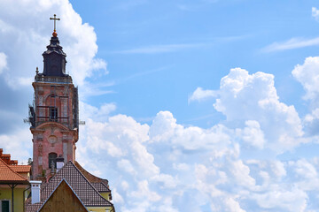 Belfry of the Christian Cathedral.Roofs the medieval city.Blue sky,clouds