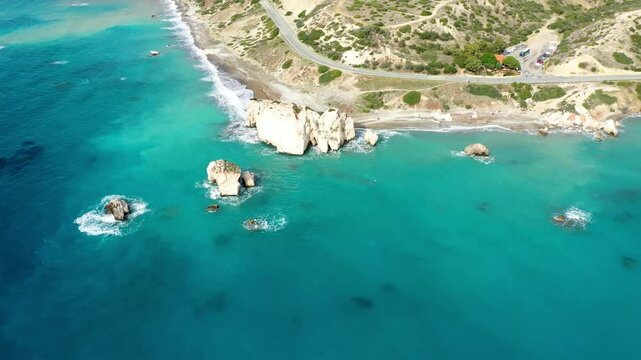 Petra tou Romiou (Aphrodite's Rock) the birthplace of Aphrodite, Paphos, Cyprus. Aerial view of Petra tou Romiou, aka Aphrodite's rock a famous tourist travel destination landmark in Paphos, Cyprus.